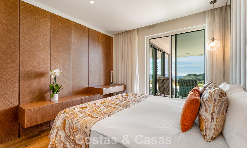 Appartement moderne avec jardin à vendre, offrant une vue sur la côte, dans un complexe fermé près de la ville de Marbella 794497