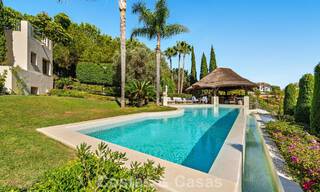 Villa de luxe espagnole remarquable à vendre dans une oasis de verdure sur le Golden Mile de Marbella 798205 