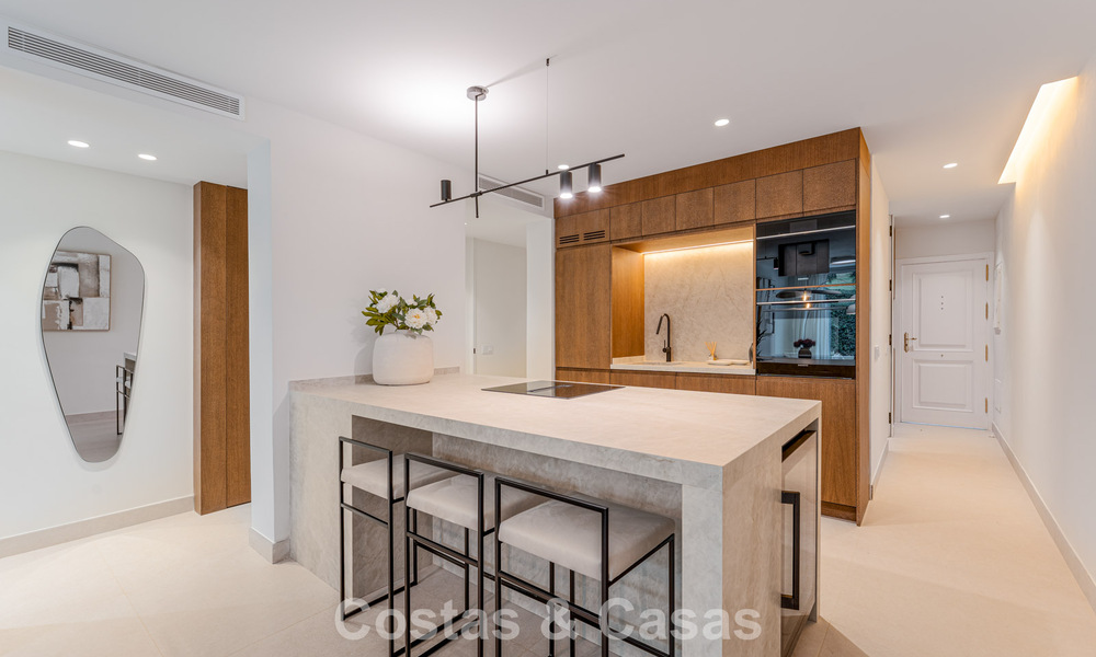 Appartement de jardin élégant rénové à vendre dans un prestigieux parcours de golf à La Quinta, Benahavís - Marbella 797943