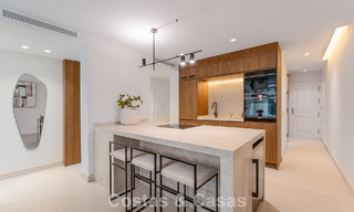 Appartement de jardin élégant rénové à vendre dans un prestigieux parcours de golf à La Quinta, Benahavís - Marbella 797943 
