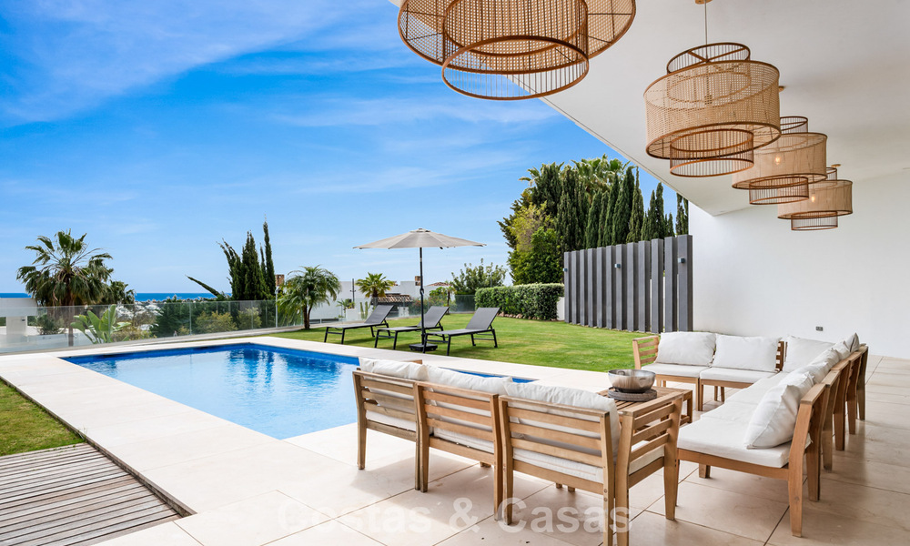 Villa contemporaine avec vues panoramiques sur la mer à vendre dans un prestigieux quartier de golf à Marbella - Benahavís 798839