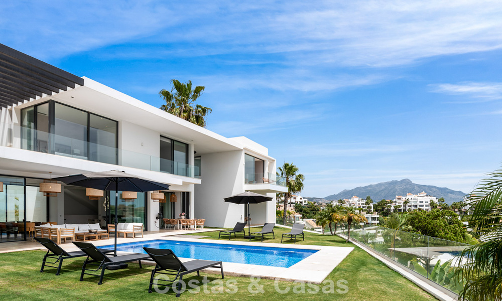 Villa contemporaine avec vues panoramiques sur la mer à vendre dans un prestigieux quartier de golf à Marbella - Benahavís 798847