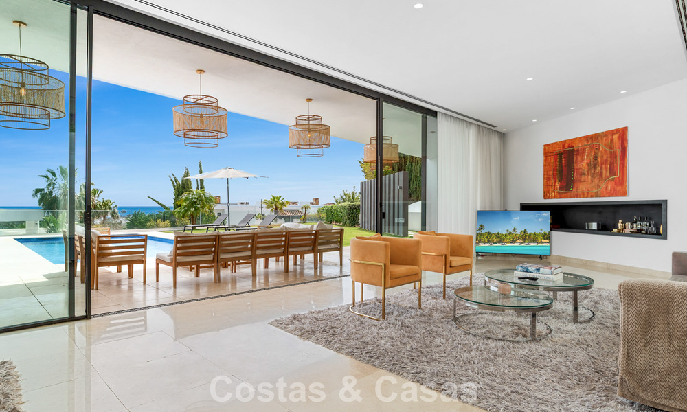 Villa contemporaine avec vues panoramiques sur la mer à vendre dans un prestigieux quartier de golf à Marbella - Benahavís 798881
