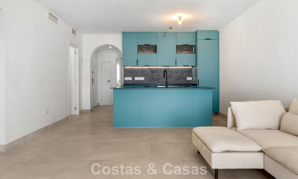 Élégant appartement en rez-de-chaussée avec vue sur la mer à Nueva Andalucía, à distance de marche de Puerto Banús, Marbella 799773