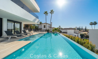 Villa de luxe sophistiquée à vendre avec vue panoramique dans la prestigieuse vallée du golf de Nueva Andalucía, Marbella 800339 