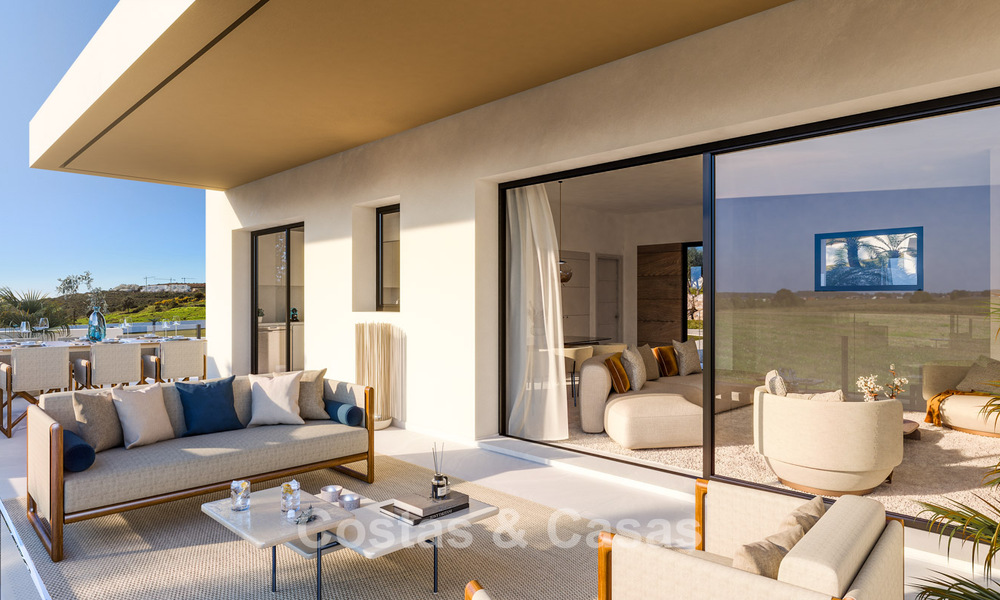Lancement! Villas mitoyennes contemporaines à vendre dans un environnement golfique privilégié à Estepona 800558
