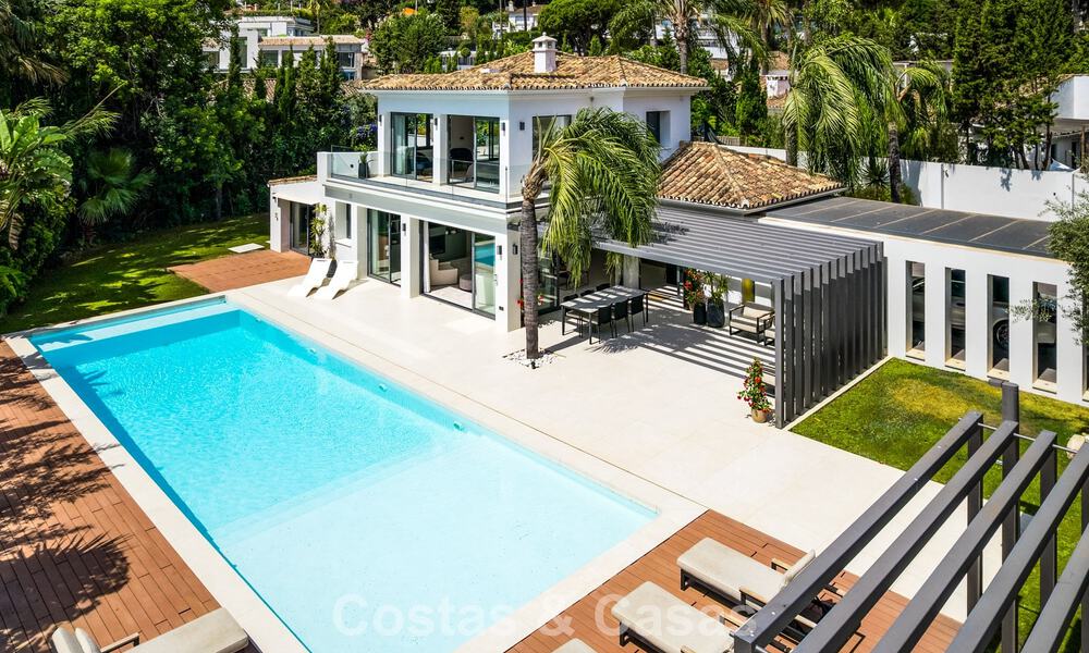 Villa de luxe moderne avec piscine chauffée à vendre dans la Vallée du Golf de Nueva Andalucía, Marbella 801998
