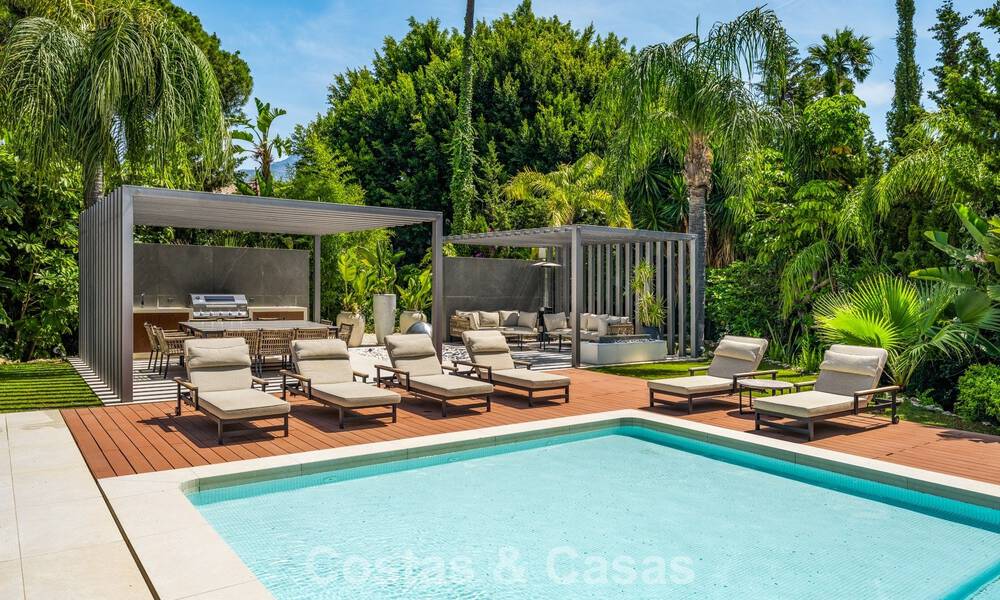 Villa de luxe moderne avec piscine chauffée à vendre dans la Vallée du Golf de Nueva Andalucía, Marbella 802001
