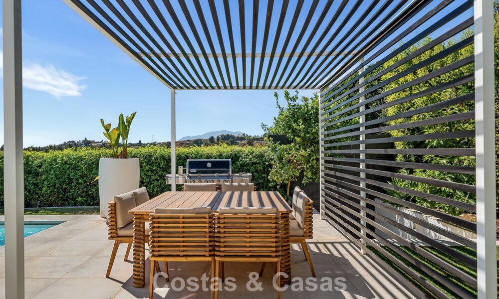 Villa contemporaine de 5 chambres en première ligne de golf à Nueva Andalucía, Marbella 806790