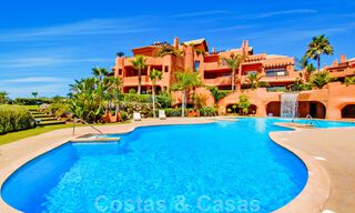 Appartements et penthouses de luxe à vendre en première ligne de plage à Marbella 33849 